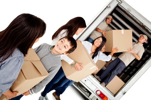 A local removals team loading items for house removals in Islington