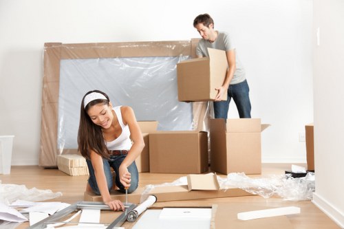 Removal team handling urgent same-day moving in an Islington street