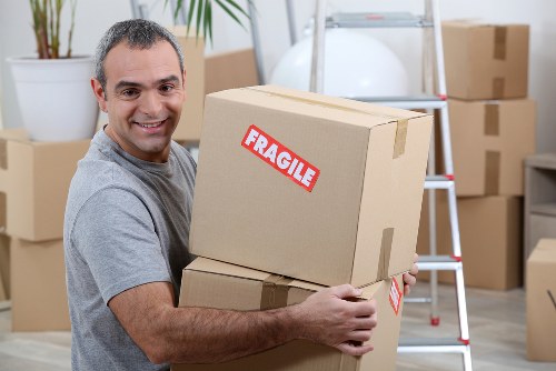 Office relocation planning in Islington with moving boxes and workspace setup