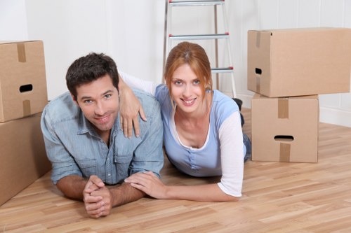 Removal team handling boxes during an Islington home move