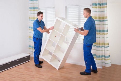 Professional furniture removal team loading items in Islington