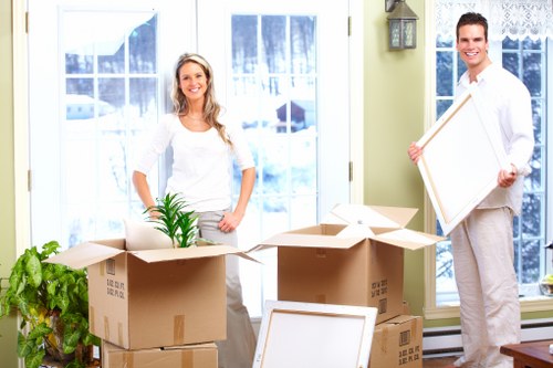 Packed boxes and furniture ready for storage in Islington