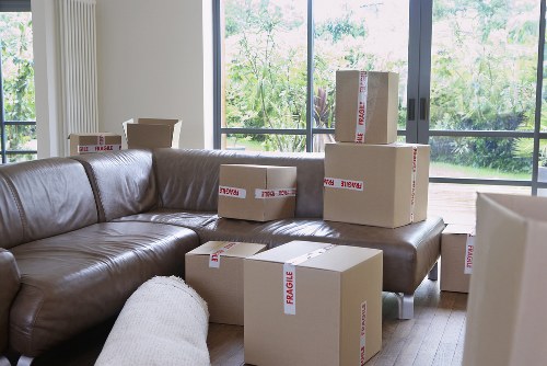 Careful packing supplies used for a home move in Islington