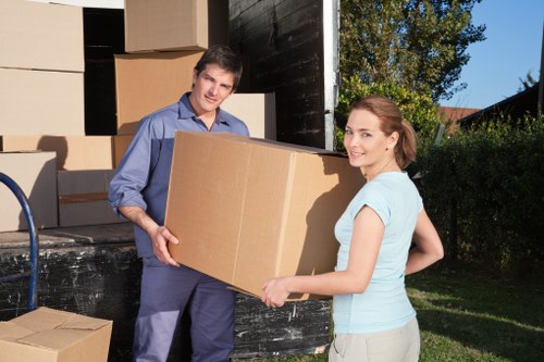 Professional movers packing boxes for an Islington relocation
